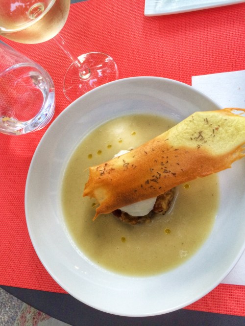 Chilled Eggplant soup with a poached egg and sesame crisp