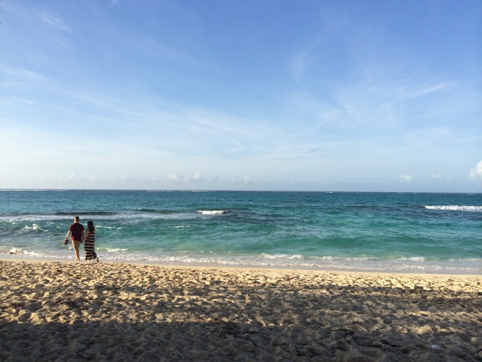 Our new friends Kelsey and Nigel walking along the beach.